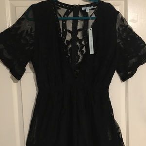 Brand new! Black lace romper size Medium